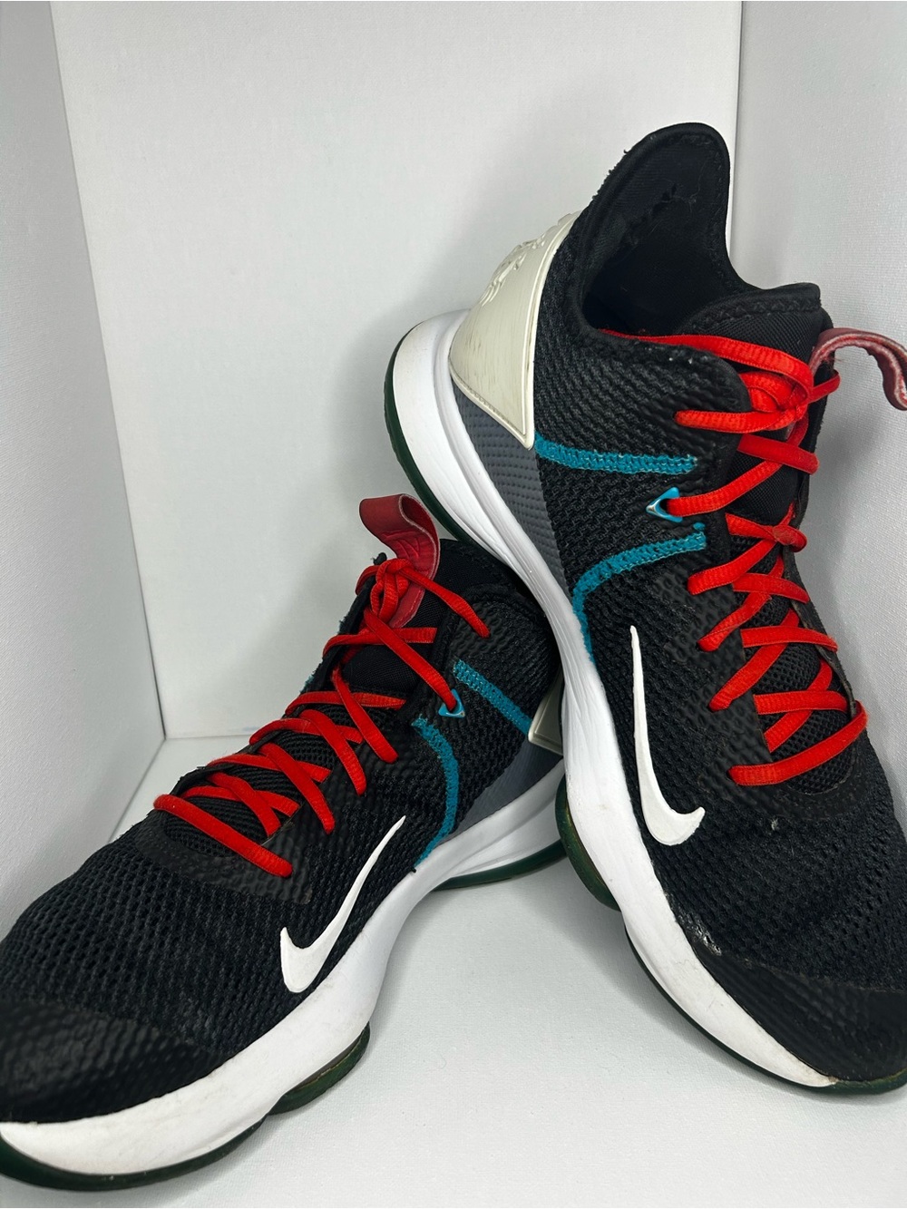 Nike Men’s Black Sneakers with Red Laces and Teal Accents